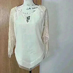 Adiva crochet lace triangle hem bell flutter sleeve boho cutout top